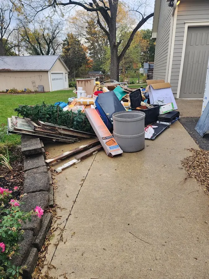 Dumpster being loaded with debris for 3 Yard Dumpster Rental in Guerneville